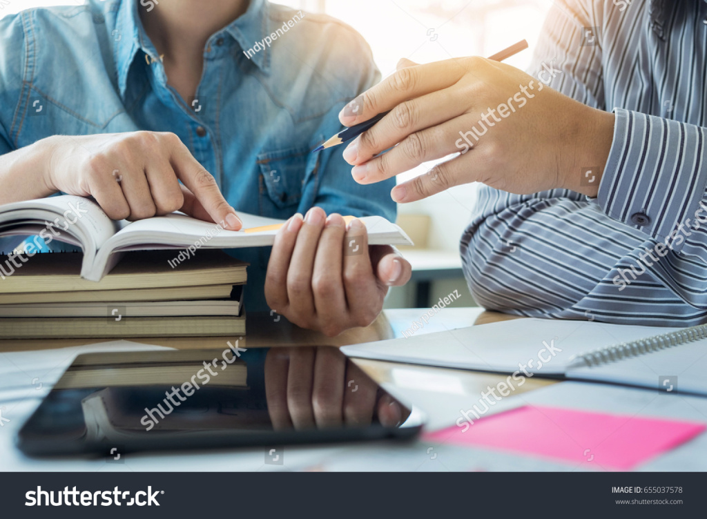 stock-photo-young-students-campus-helps-friend-catching-up-and-learning-tutoring-people-learning-education-655037578.jpeg